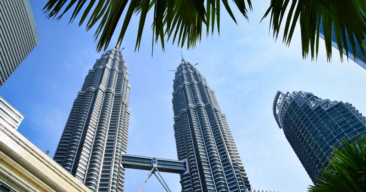 Petronas Twin Towers rising above Kuala Lumpur